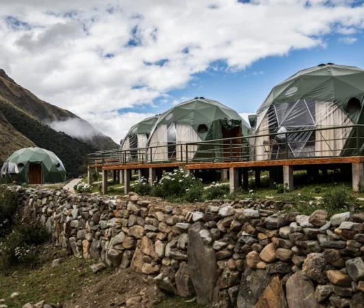 Explore sustainable eco-friendly dome tents in the scenic Peruvian Andes, perfect for nature lovers.