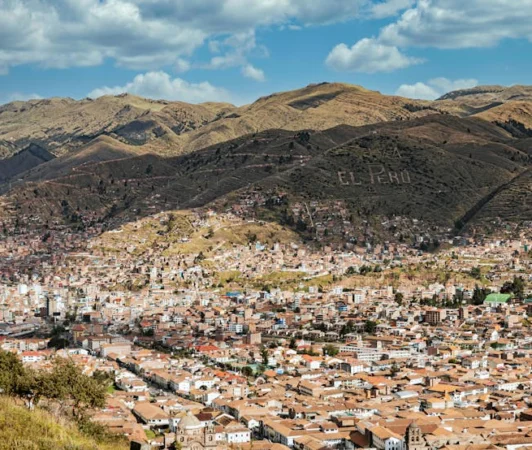Breathtaking aerial view of Cusco in Peru, nestled in the Andean mountains.